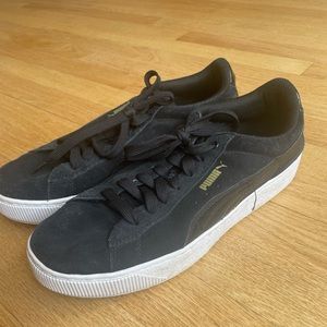 Black Puma sneakers